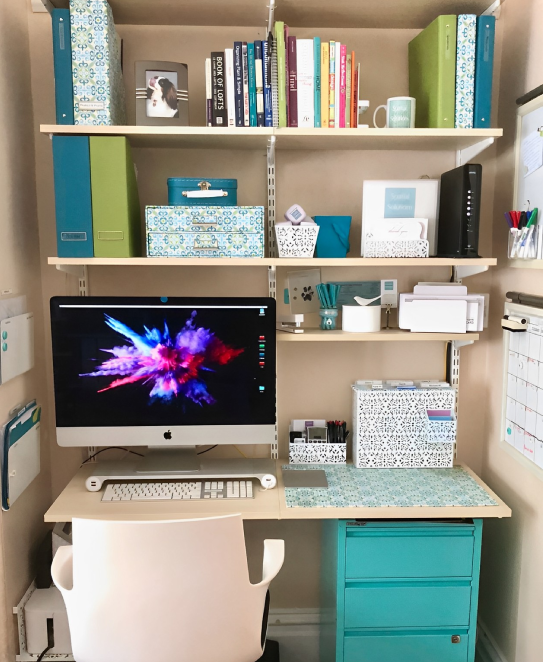 Organized home office with teal accents.